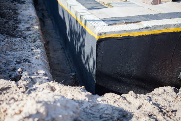 Professional Exterior Waterproofing technician working in Robertsdale, AL